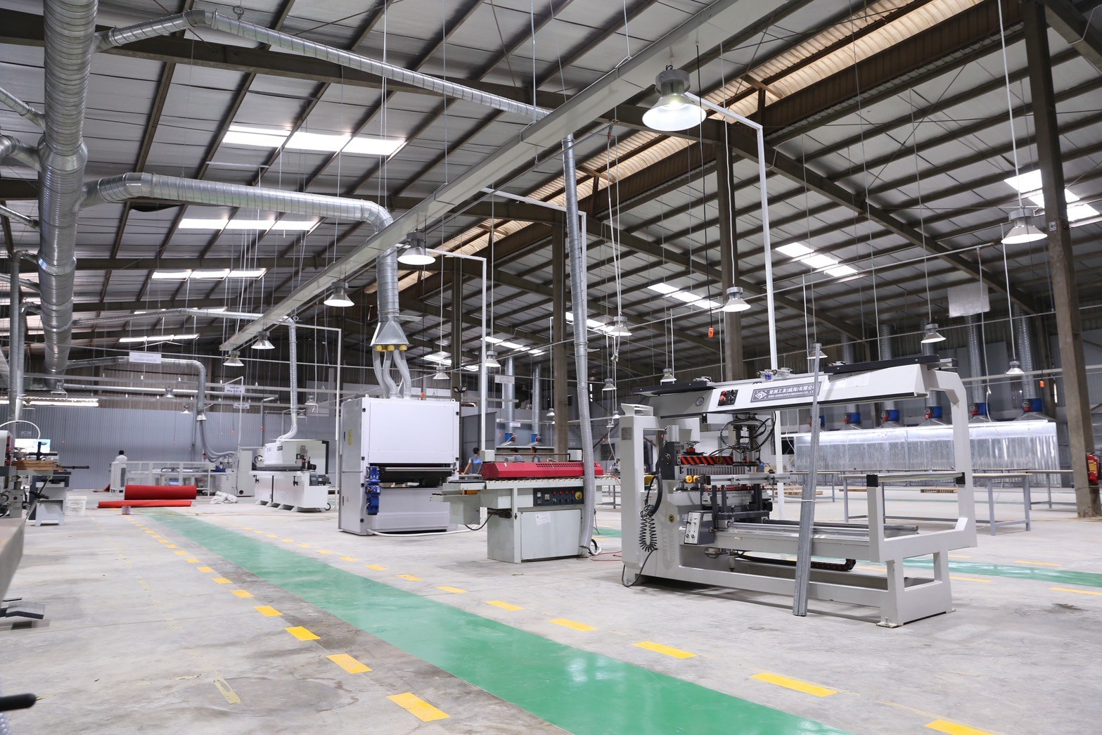 Furniture production hall with woodworking machinery